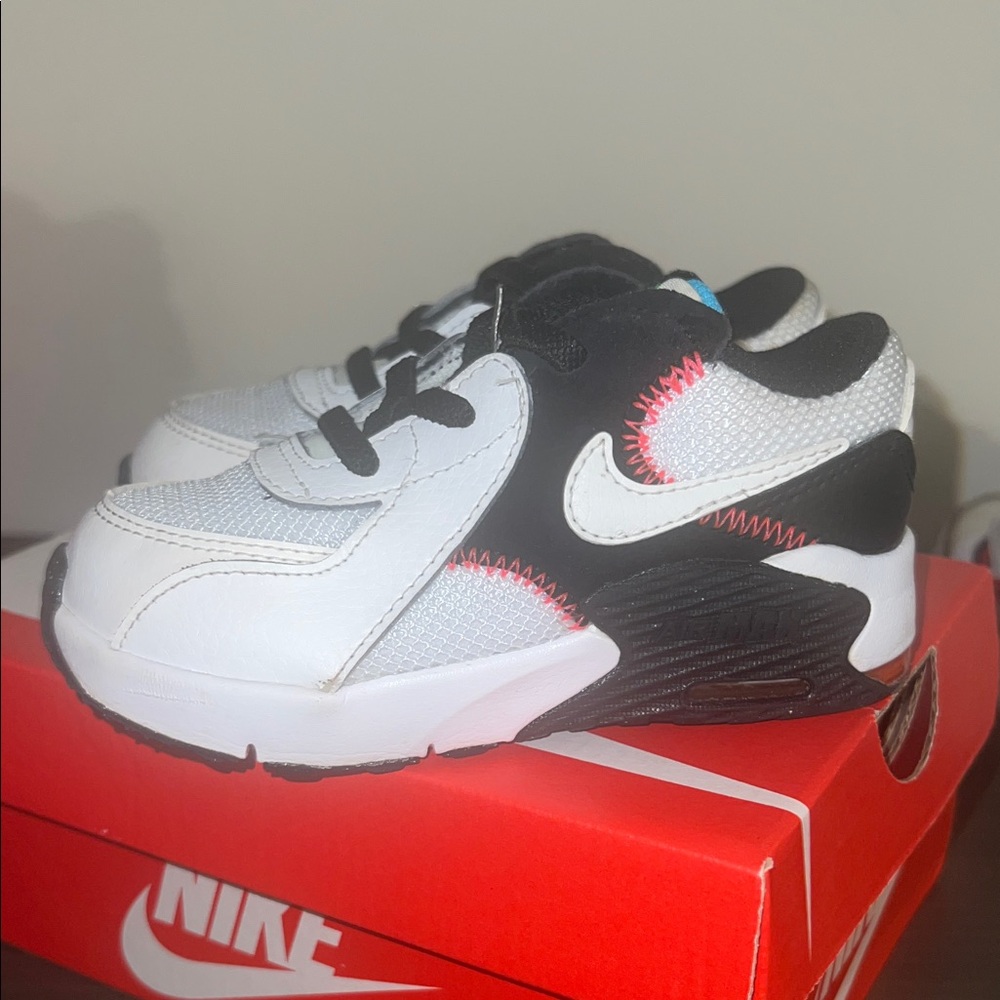 Nike Kids' White and Black Sneakers with Red Accents